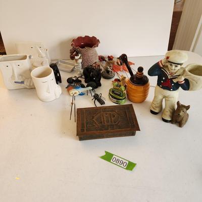 Collectible Lot Cast Iron Cracker Jack Sailor Door Stop Fitz & Floyd Faces, African Wise Monkeys, and other trinkets