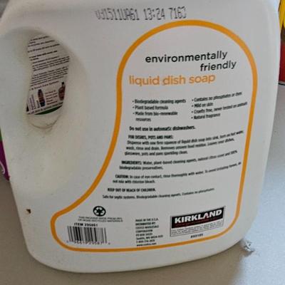 Cleaning supplies and trash can