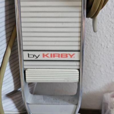 Kirby vacuum and Shark slim steam mop