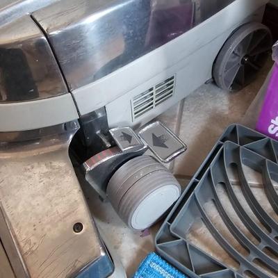 Kirby vacuum and Shark slim steam mop