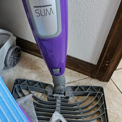 Kirby vacuum and Shark slim steam mop