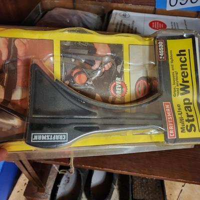 2 Shelves of Tools bench vise, Planes , Drills, Dremel, Strap Wrench, Masks,