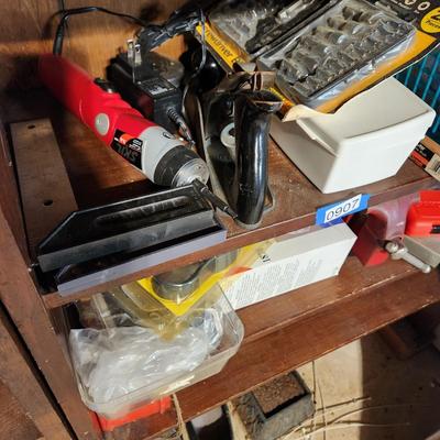 2 Shelves of Tools bench vise, Planes , Drills, Dremel, Strap Wrench, Masks,