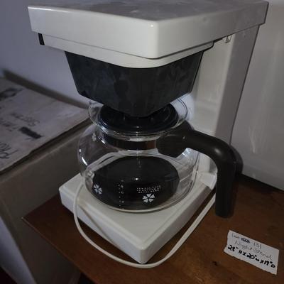 Pair of coffee pots.