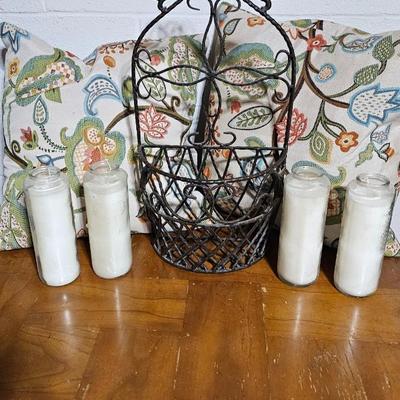 Wrought Iron basket with candles and two throw pillows