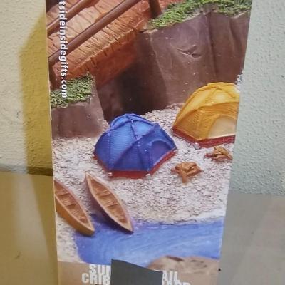 Cool Summit trail cribbage board and an assortment of playing cards and travel games