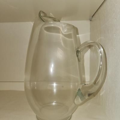 Glass juice pitcher.