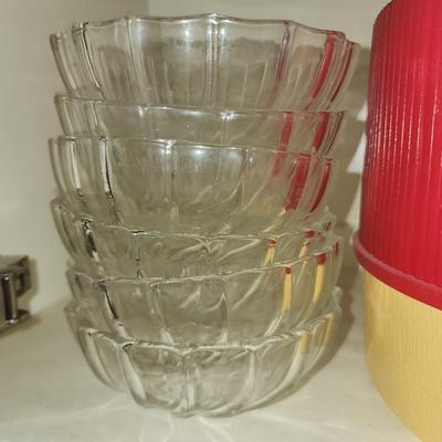 Six glass finger bowls.