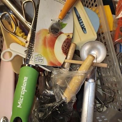 Basket of kitchen utensils.