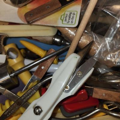 Basket of kitchen utensils.