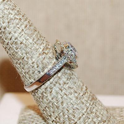 Size 7 ¼ Marked .925 Round Clear Stone Ring in a Hexagon Setting, Brilliant Accents & Silver Band (4.1g)