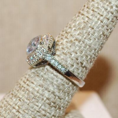 Size 7 ¼ Marked .925 Round Clear Stone Ring in a Hexagon Setting, Brilliant Accents & Silver Band (4.1g)