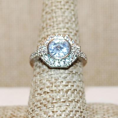 Size 7 ¼ Marked .925 Round Clear Stone Ring in a Hexagon Setting, Brilliant Accents & Silver Band (4.1g)