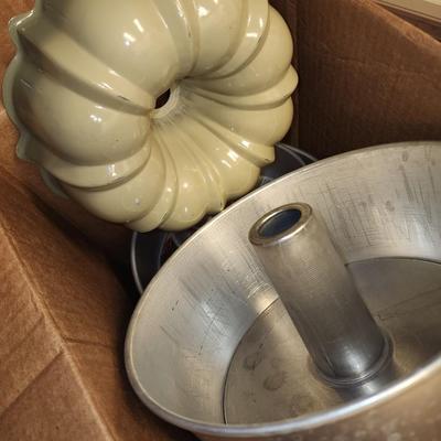 Box of kitchen pans and more.