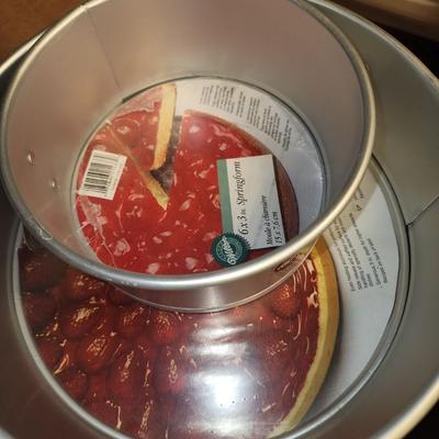 Box of kitchen pans and more.