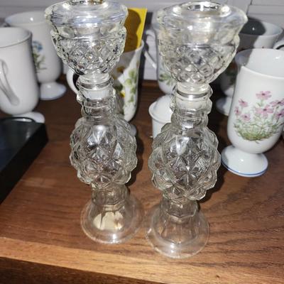 Pressed glass candle sticks.