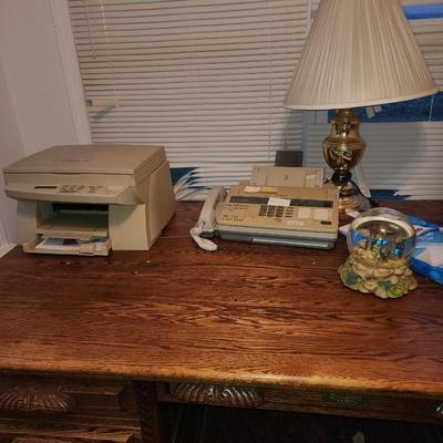 Desk, chair lamp and old tech.