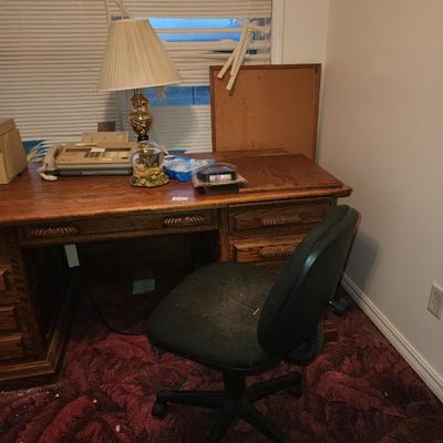 Desk, chair lamp and old tech.