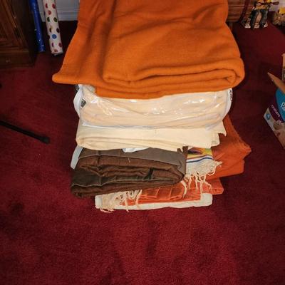Stack of blankets.