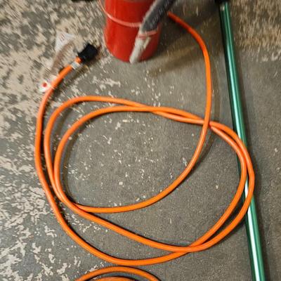 Extended Light bulb changer pole, extension cord and fire extinguisher