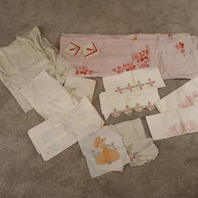 Vintage embroidered linens- pillowcases and lace tablecloth