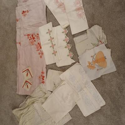 Vintage embroidered linens- pillowcases and lace tablecloth