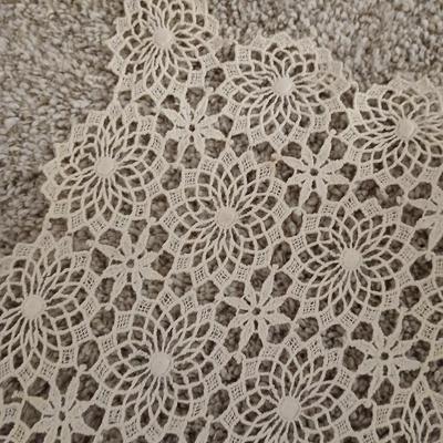 Grouping of wicker baskets and Doilies with pottery vase