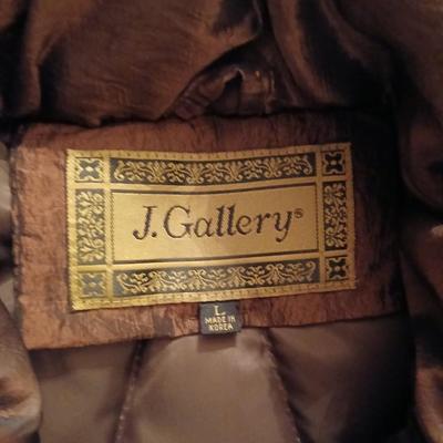 Genuine leather size 16 coat Lon size Large heavier winter coat and a soft black vest