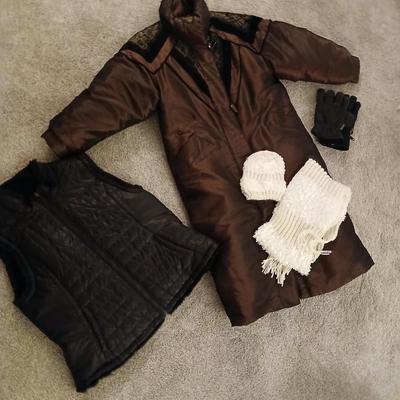 Genuine leather size 16 coat Lon size Large heavier winter coat and a soft black vest