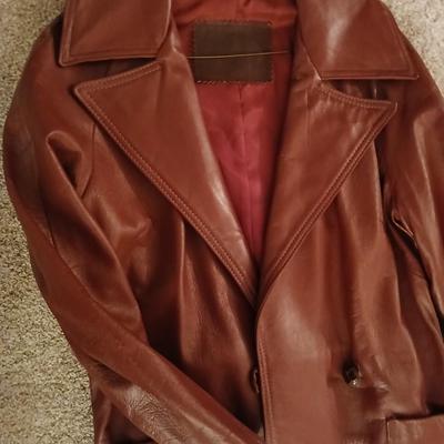 Genuine leather size 16 coat Lon size Large heavier winter coat and a soft black vest