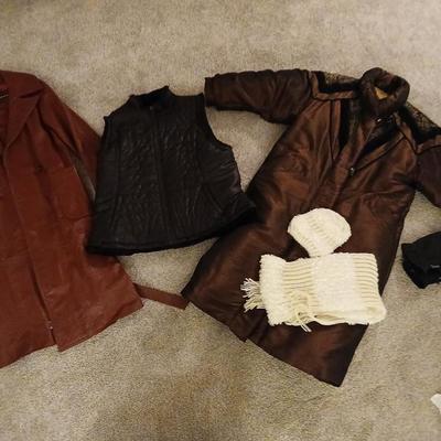 Genuine leather size 16 coat Lon size Large heavier winter coat and a soft black vest