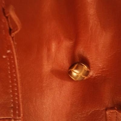 Genuine leather size 16 coat Lon size Large heavier winter coat and a soft black vest