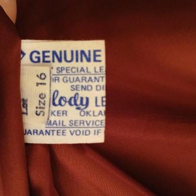 Genuine leather size 16 coat Lon size Large heavier winter coat and a soft black vest