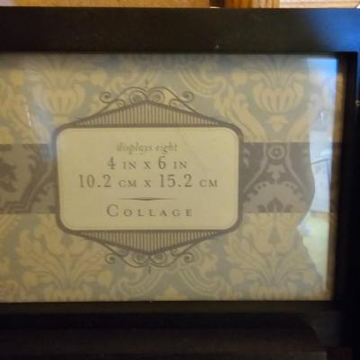 Assortment of framed artwork, picture frames, and photo album books