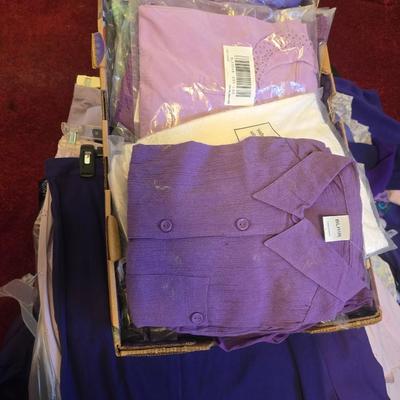 Sale Photo Thumbnail #553: Over 50 peices of clothes, Large tops some still in bags or tagged, bottoms sizes are around 10. Purple leather jacket and dresses included.