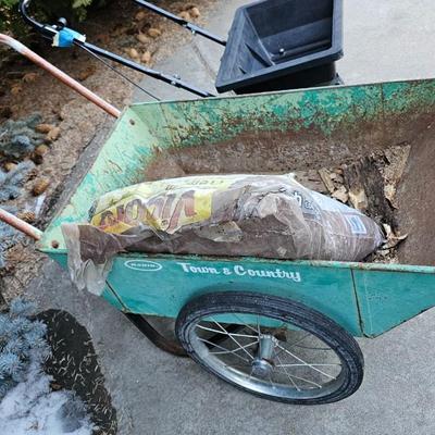 Vintage metal two-wheel Yard & Country Garden cart and fertilizer Spreader