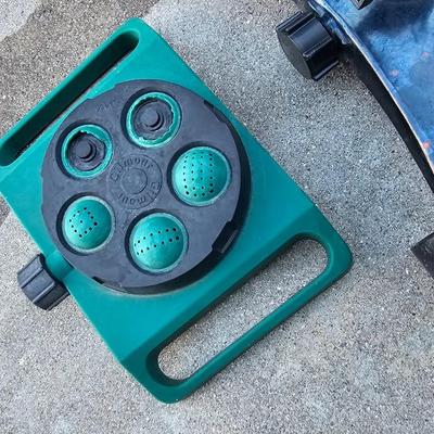 Garden hose with gutter cleaning tool and a few sprinklers