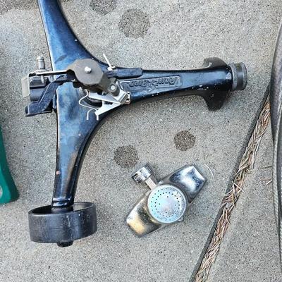 Garden hose with gutter cleaning tool and a few sprinklers