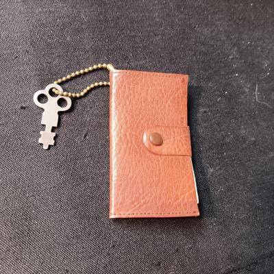 557 LEVIS BRASS BELT BUCKLE AND A MEEKER MADE AUTO KEY AND LICENSE CASE