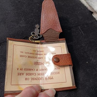 557 LEVIS BRASS BELT BUCKLE AND A MEEKER MADE AUTO KEY AND LICENSE CASE
