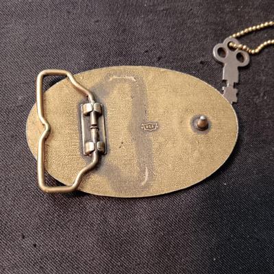 557 LEVIS BRASS BELT BUCKLE AND A MEEKER MADE AUTO KEY AND LICENSE CASE