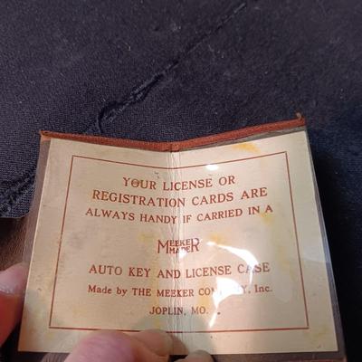 557 LEVIS BRASS BELT BUCKLE AND A MEEKER MADE AUTO KEY AND LICENSE CASE