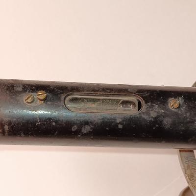 VINTAGE SURVEYORS TRANSIT LEVEL AND AN ANTIQUE TAPE MEASURE