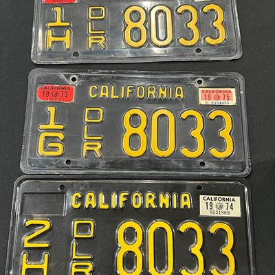 3 Vintage Black and Yellow Dealer License Plates