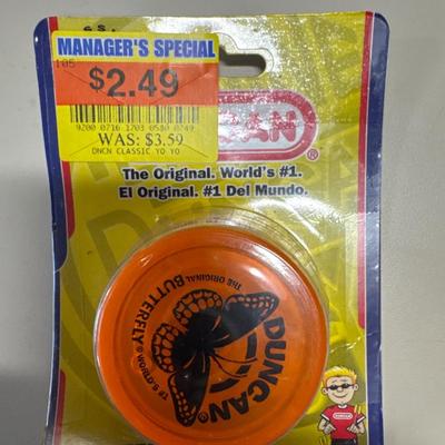 Micro machines a Camaro that makes sounds a Duncan yo-yo and a Shrek McDonald’s happy meal toy