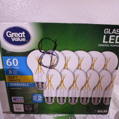 10 light bulbs; 3 candelabra base bulbs, 2 motion sensors