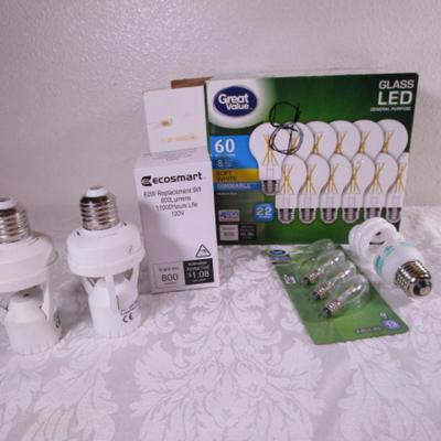 10 light bulbs; 3 candelabra base bulbs, 2 motion sensors