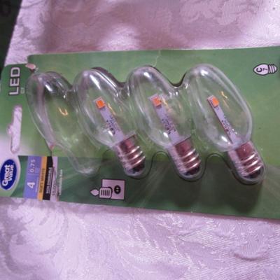 10 light bulbs; 3 candelabra base bulbs, 2 motion sensors