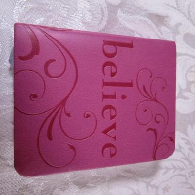 1 book "Believe", wall hanging also "Believe"