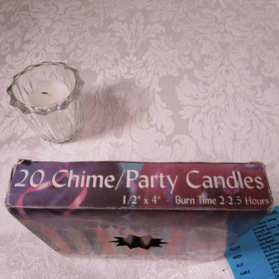 20 party candles, 1 votive candle with holder